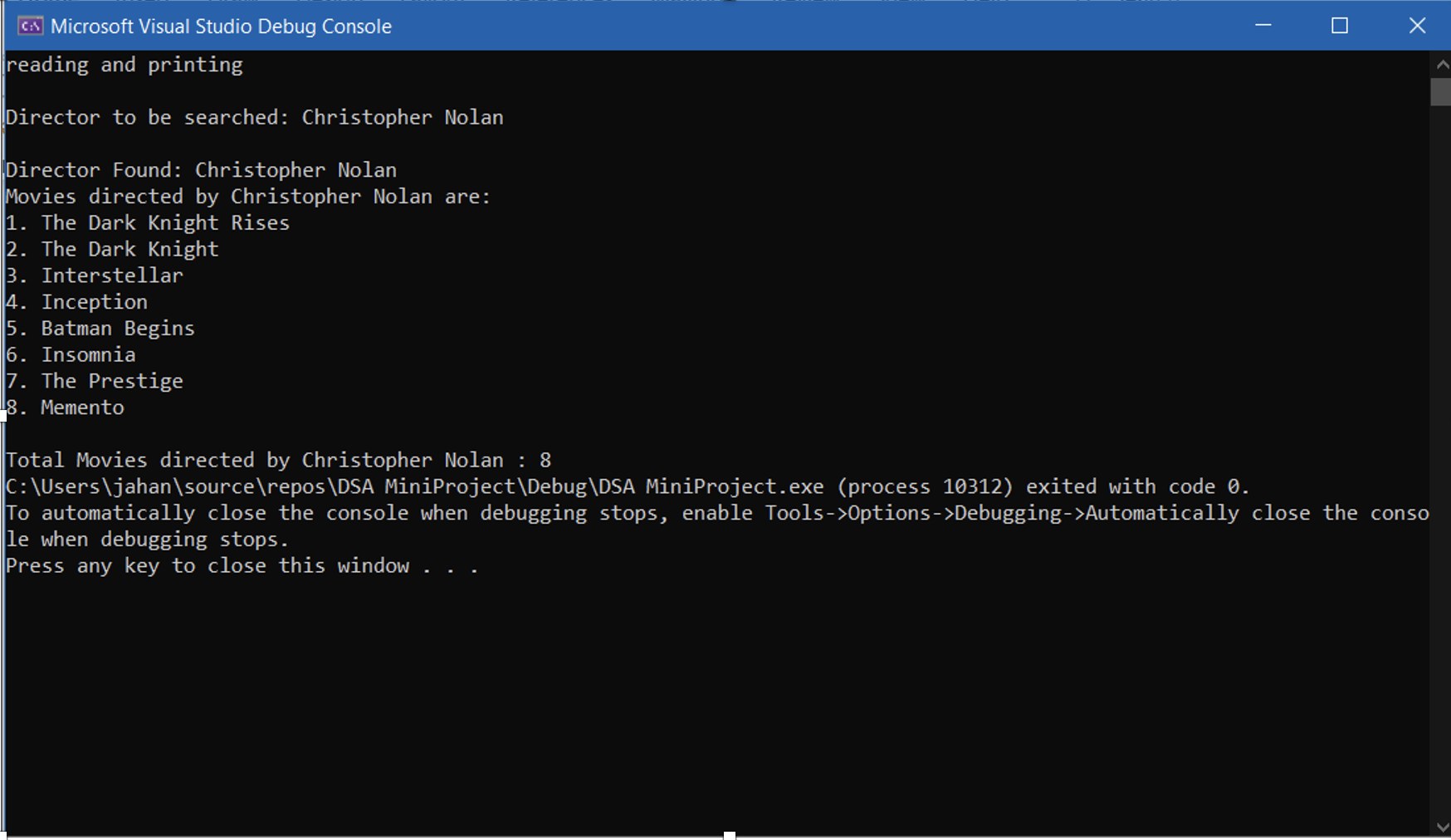 The IMDB engine running in a console, listing all films directed by Christopher Nolan.